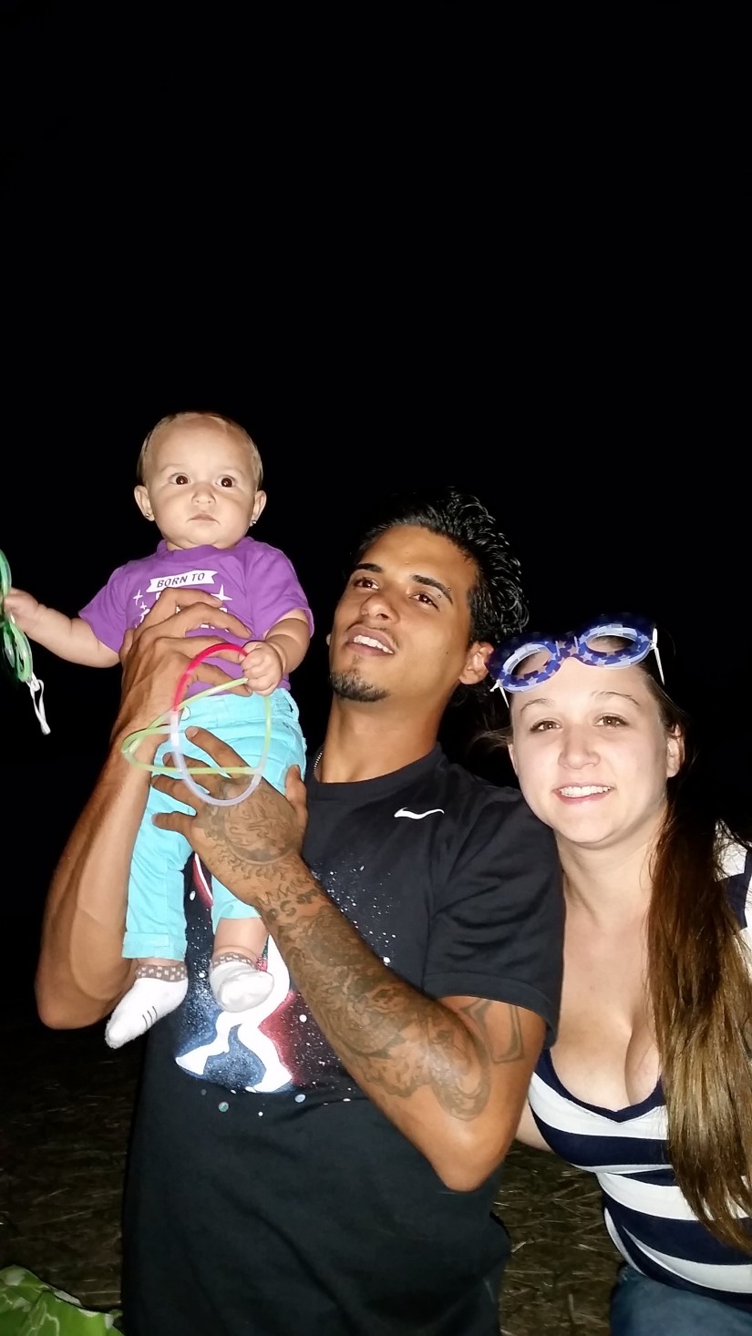 Elleanna with Mommy and Daddy during here first Fourth of July fireworks. 