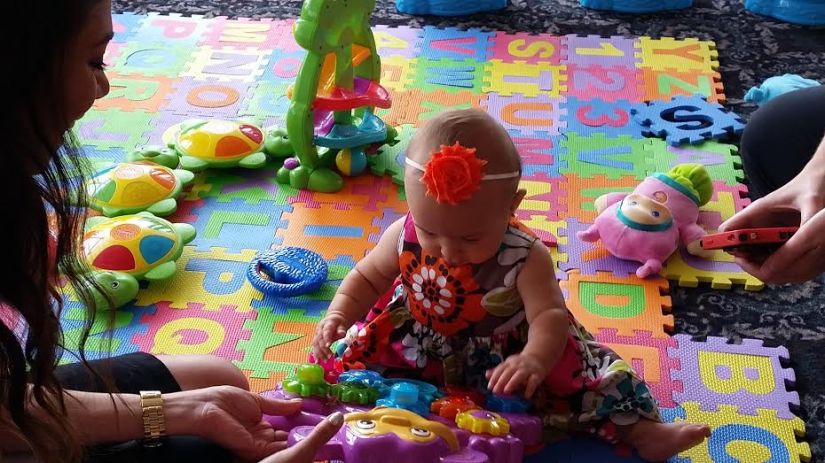Elleanna interacting as she plays with what seemed to be her favorite toy.